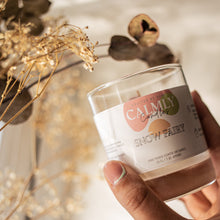 Load image into Gallery viewer, 20cl Snow Fairy Soy Wax Candle with an elegant and fun label. Calmly candles crafted by hand soy wax fragrance candles. Snow fairy scented soy candles in 3 sizes, 30cl, 20cl and 4cl. Hand poured in Surrey, UK. Vegan and cruelty free. 100% cotton wick